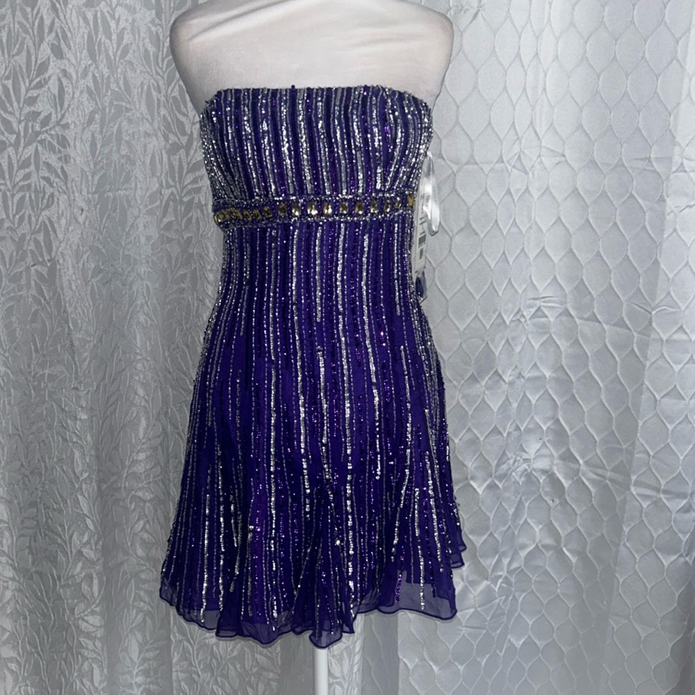Purple fit to flair strapless HOCO dress